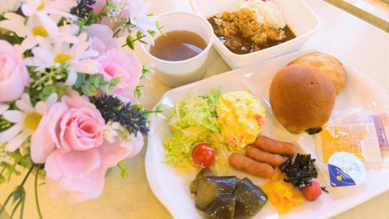 Toyoko Inn Osaka Itami Airport Toyonaka Bagian luar foto